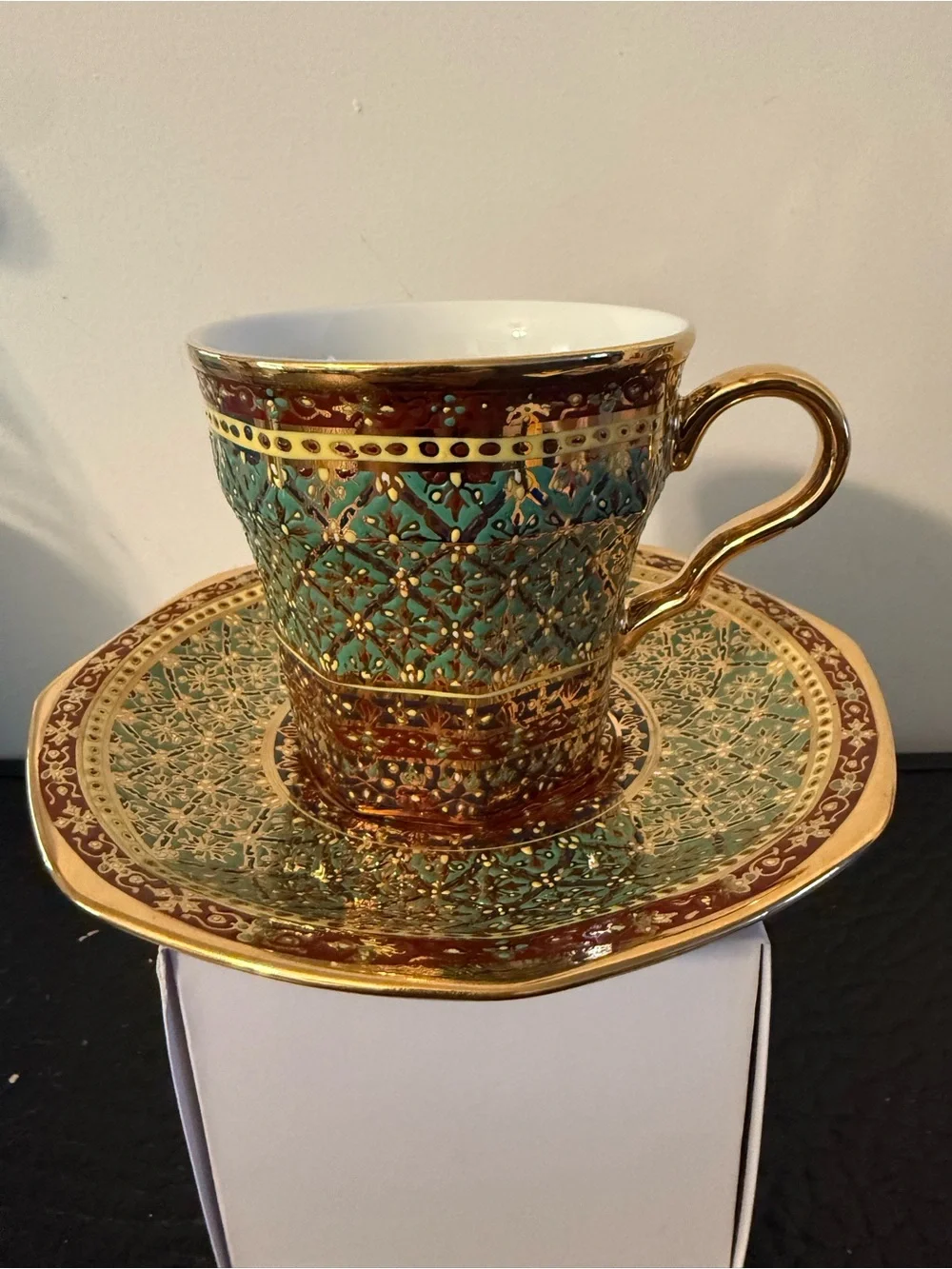 PIPATANA BENJARONG Green red and Gold Porcelain Teacup with Saucer.
